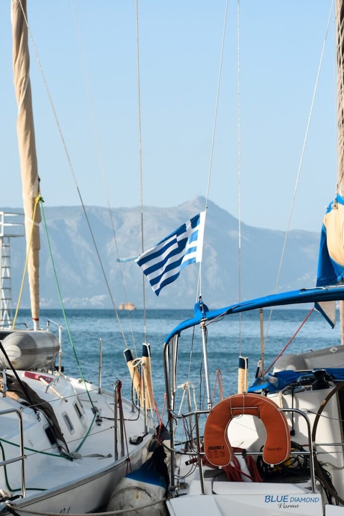 a group of sailboats docked in the water