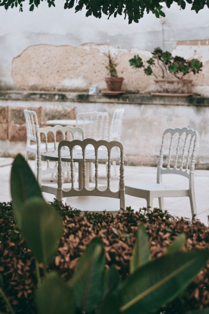 white plastic chairs on white concrete stairs