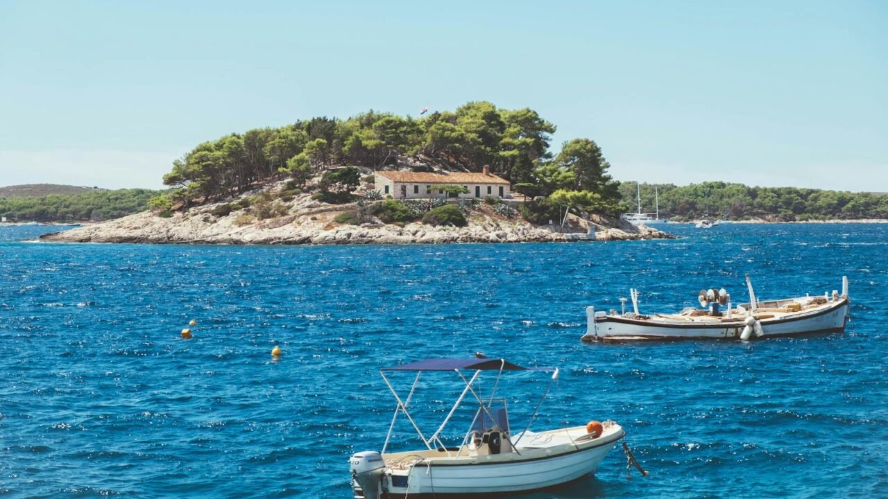 Boats Near Island in Bay of Adriatic Sea in Croatia